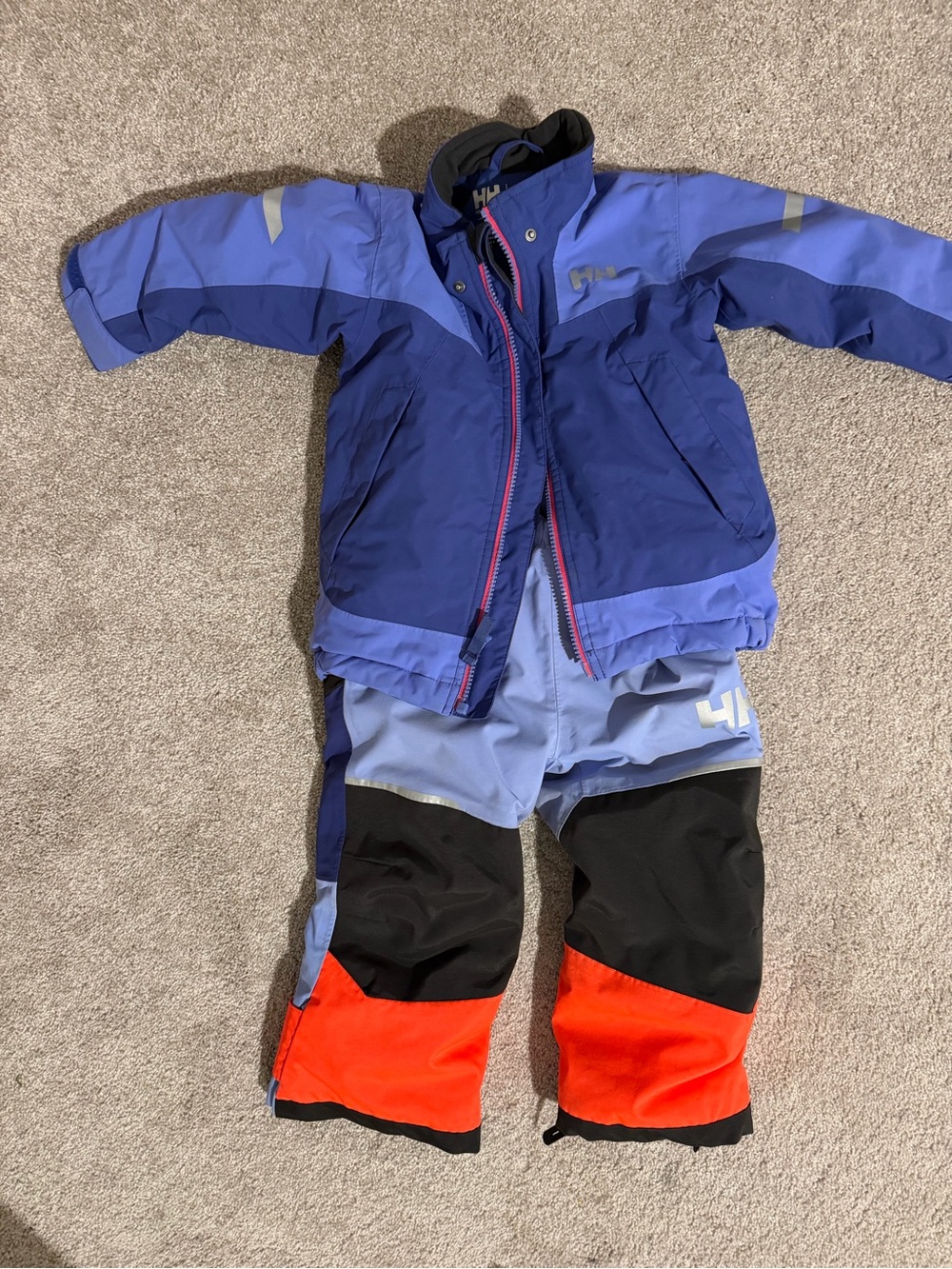 Helly Hansen Kids Two-Piece Ski Suit in Purple with Orange Accents